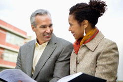 Male and Female Friends Talking Outside
