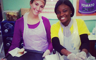 Two Women Serving Food