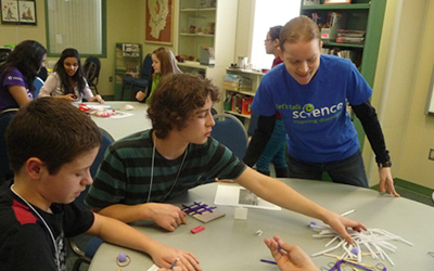 A Woman Teaching Students