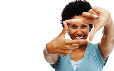 Woman Making Snapshot With Fingers
