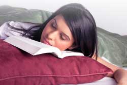 Woman Sleeping on Books