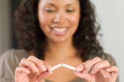 Female Breaking Cigarette
