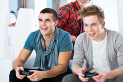 Teenagers Playing Video Games