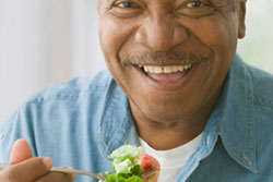Older Male Eating Salad