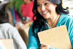 Female Volunteer With Clipboard