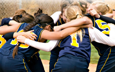 Sports Team in a Huddle