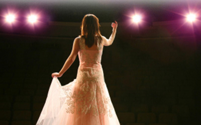 Woman Performing on Stage