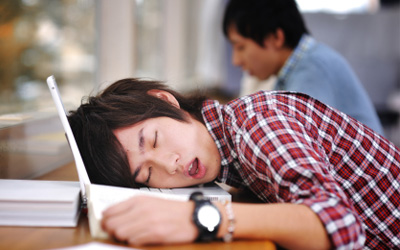 Male Student Sleeping in the Classroom